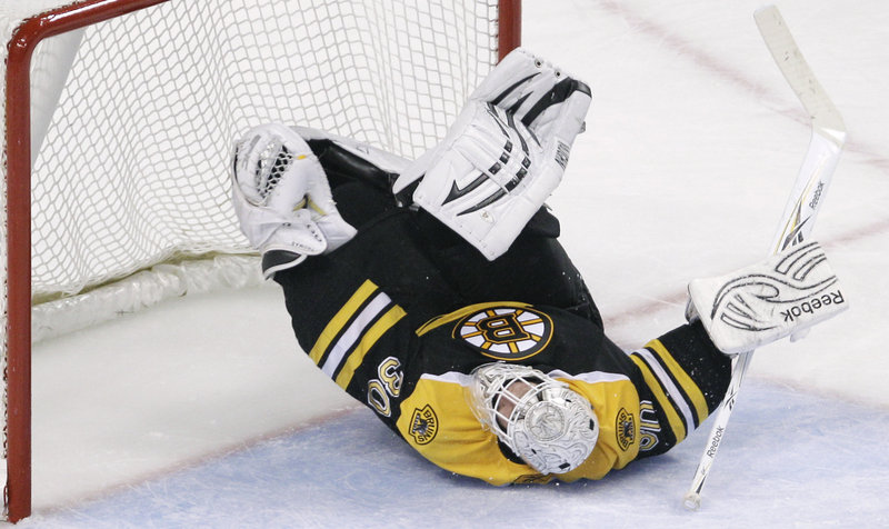 Tim Thomas makes one of his 28 saves during Boston’s 3-0 win over the New Jersey Devils on Monday. Thomas, who improved to 9-1, said it was important for the Bruins to stop a two-game slide.