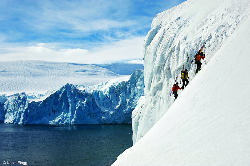 Keoki Flagg Ski mountaineers make their way up a steep Antarctic slope during the filming of “Wintervention,” which is narrated by skiing icon Johnny Moseley.