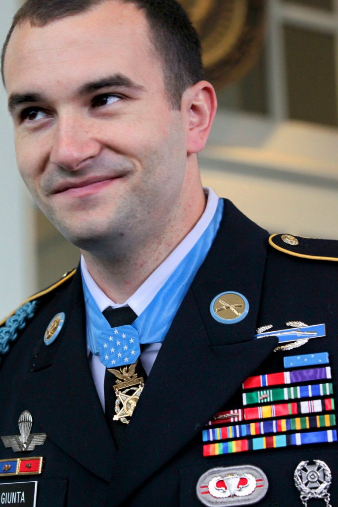 Staff Sgt. Salvatore Giunta leaves the White House wearing the Medal of Honor presented to him Tuesday by President Obama. Giunta, 25, of Hiawatha, Iowa, also has received the Bronze Star Medal and the Purple Heart, along with other awards displayed on his uniform.