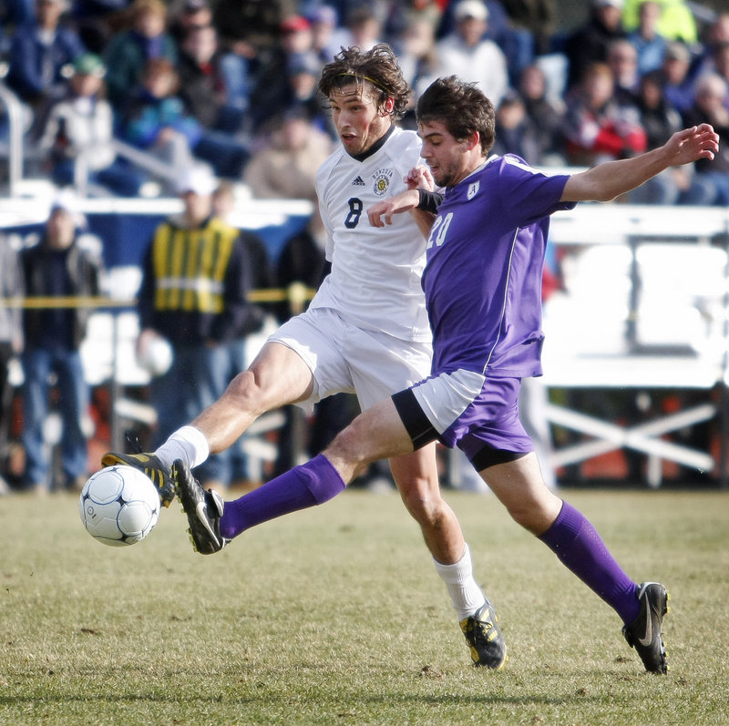 Nick Powell, left, of Bowdoin and Amherst's Chris Lerner try to control the ball during their NCAA Division III men's soccer sectional semifinal Saturday.