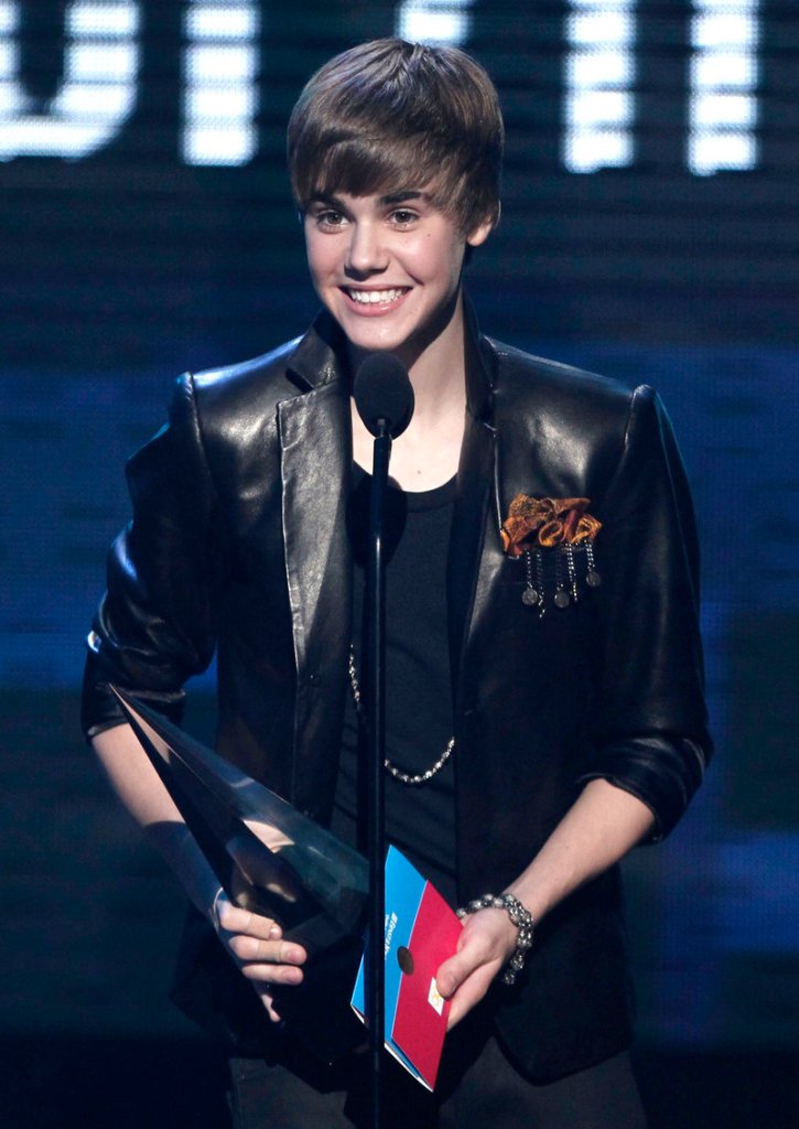 Justin Bieber accepts the award for pop-rock favorite male artist at the American Music Awards on Sunday.