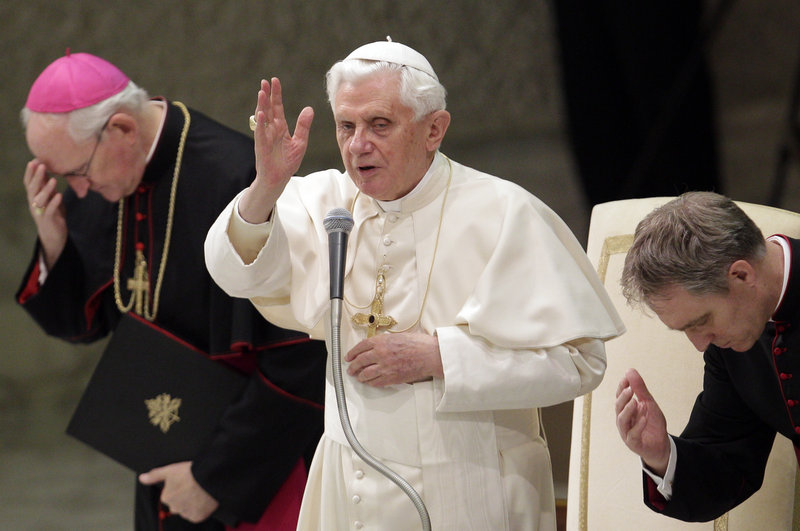 Pope Benedict XVI blesses the faithful Monday during an audience for newly appointed cardinals and their relatives. On Tuesday, the Vatican expanded on the pope’s recent comments on condoms as a means of fighting HIV by stating that their use is a step toward a more moral sexuality, even if they prevent a pregnancy.