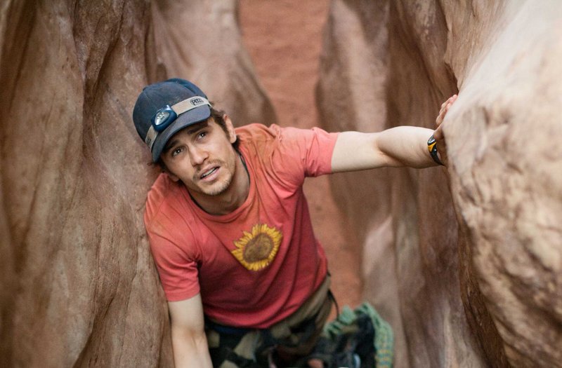 James Franco delivers a bravura performance as Aron Ralston, a self-reliant thrill-seeker trapped in the canyons of Utah, in Danny Boyle’s “127 Hours.”