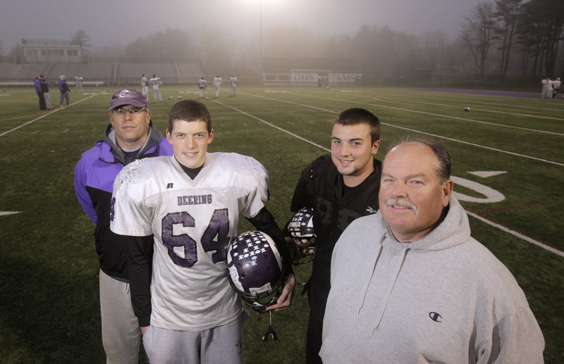 They've lived through the season together as father and son, and coach and player. Today they will be on the sidelines together again. Representing Deering are, left, head coach Greg Stilphen and his son, Alex; and assistant coach Ted Ross and his son, Jamie.