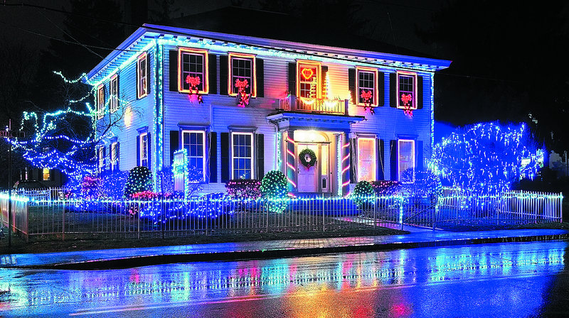 For the second year, the offices of Augusta Orthodontics are lighting up the holiday-season nights. Dr. Darryl Zeleniak, who says National Lampoon movie misadventurer Clark Griswold is his hero, choreographed the display.
