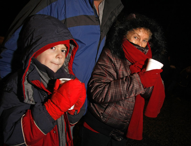 Ben Hines of York, left, and his grandmother, Millie Hines of Florida, enjoy warm cocoa and some cuddling in the cold.