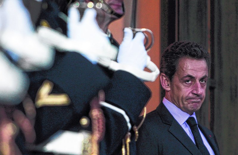 President Nicolas Sarkozy of France awaits Dutch Prime Minister Mark Rutte on Monday at the Elysee Palace in Paris. French media have questioned whether France’s public debt, at 83 percent of GDP this year, puts the country at risk.