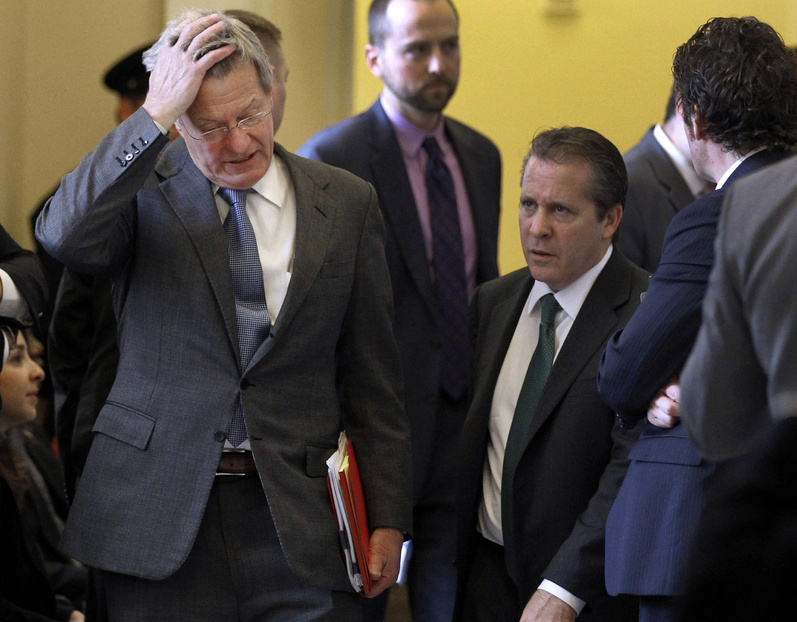 Senate Finance Committee Chairman Sen. Max Baucus, D-Mont., left, hold his head on Capitol Hill in Washington on Tuesday as negotiations continued on a bill to extended unemployment benefits and preserve tax cuts. Members of both parties should pass a bill built on this framework before they leave for the year.