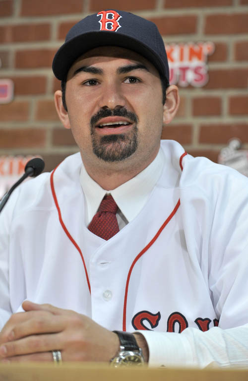 Adrian Gonzalez speaks to reporters during a news conference today at Fenway Park: "I'm very excited to start this new phase and look forward to a lot of world championships."