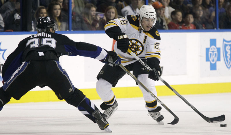 GAME-WINNER: Boston Bruins left wing Mark Recchi scored the game-winning goal with 19.7 seconds left as the Bruins beat the Tampa Bay Lightning 4-3 on Tuesday night in Tampa, Fla.
