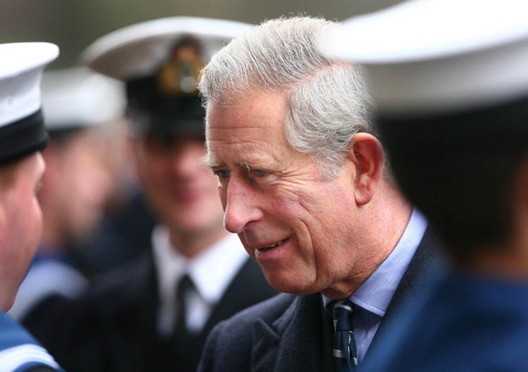 The Prince of Wales talks to navy personnel in London today as he presents operational medals for service in Afghanistan.