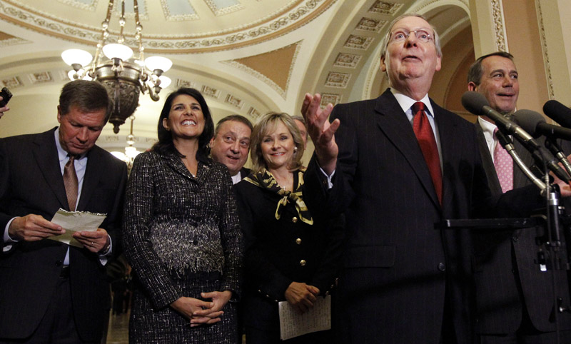 Senate Republican Leader Mitch McConnell, R-Ky., second from right, speaks as Ohio Gov.-elect John Kasich, left, stands with South Carolina Gov.-elect Nikki Haley, Maine Gov.-elect Paul LePage, Oklahoma Gov.-elect Mary Fallin, and House Speaker-designate John Boehner, R-Ohio, right, listen after their meeting on Capitol Hill on Wednesday.