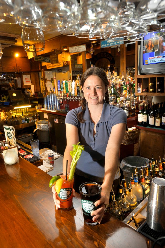 Bartender Jocelyn Harriman serves up drinks. Jameso's fiercely local tap selection rotates frequently.