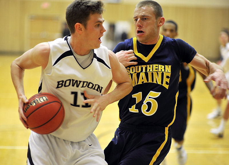 Will Hanley of Bowdoin looks for room while guarded by USM’s Leif O’Connell. Hanley, a 6-foot-7 junior, led the Polar Bears with 18 points.