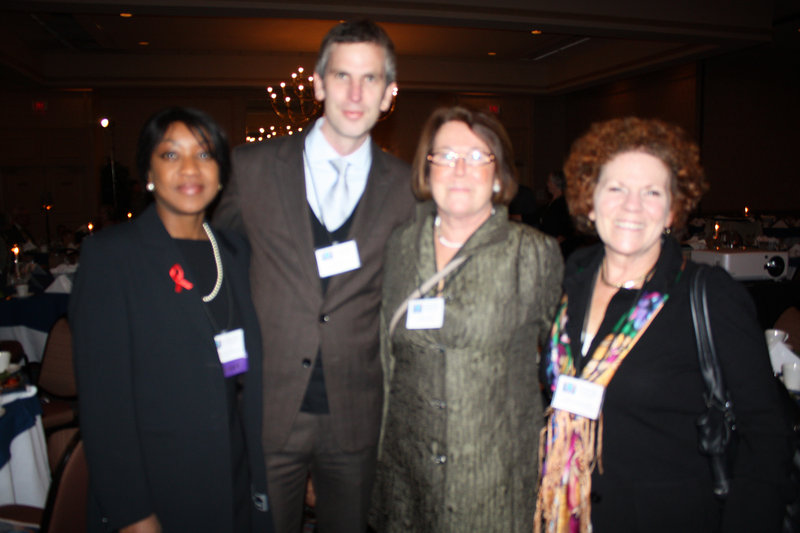 Honoree Dr. Chiedza Jokonya, left; Peter Cauwood and Jenifer Van Deusen, right, all of the Maine-Dartmouth Family Practice Residency; and Judith Burwell, of the Kaylor Co.