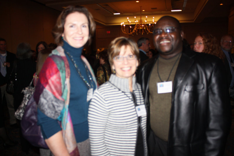 Maureen Clancy of Mercy Hospital; Leslie Brancato, the CEO of Portland Community Health Center; and Dr. Kolawole Bankole