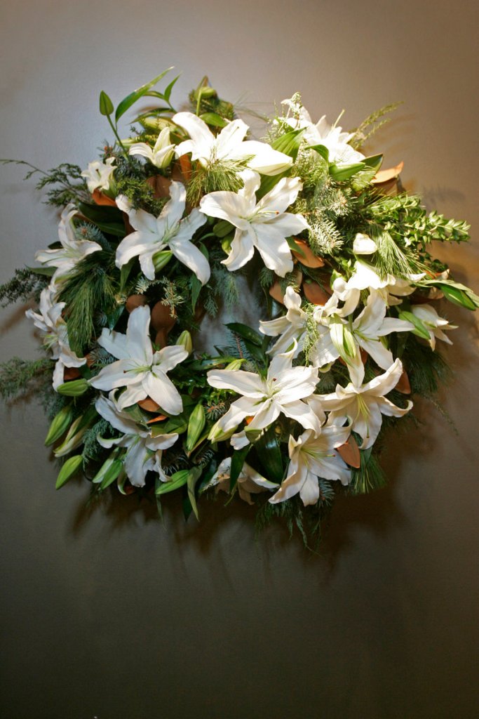 Floral designer Ania Valencia, who loves using fresh greens in her work, created a wreath of Casablanca lilies.