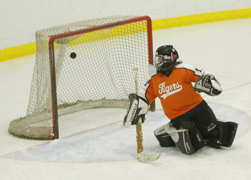 Biddeford goalie Emily Brassley, says Coach Marie Potvin, kept the score respectable as York controlled play during their high school hockey game Wednesday night at Biddeford Ice Arena.