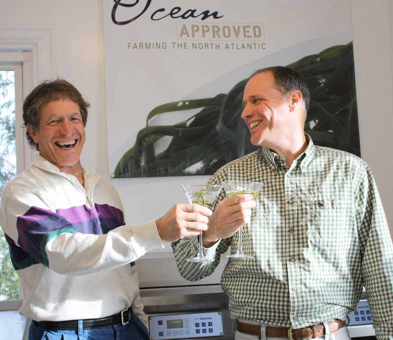 Ocean Approved owners Tollef Olson and Paul Dobbins toast with mock-ups of their "seatinis," featuring a kelp product still in development that will be marketed as a cocktail garnish.