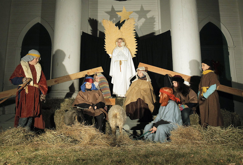 Children participate in a living Nativity tableau at the South Congregational Church in Kennebunkport on Friday. The scene was part of the town's 29th Christmas Prelude, which runs through next weekend.