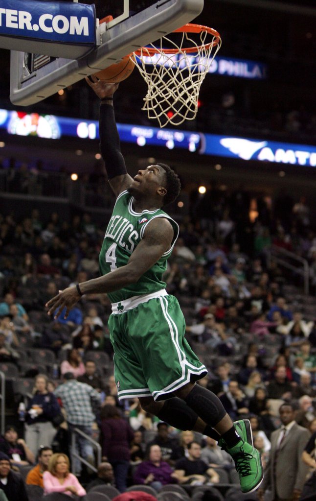 Nate Robinson hits a layup for two of his 21 points in his last-second start in the Celtics’ 100-75 win over the Nets.