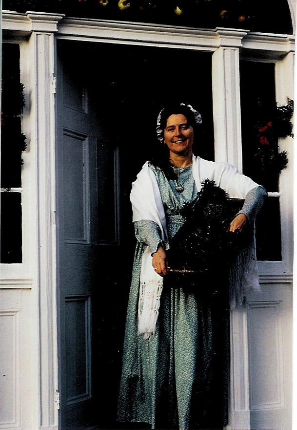 Betsey-Ann Golon, seen here in period dress, and her husband, Dale, own Common Folk Farm in Naples.