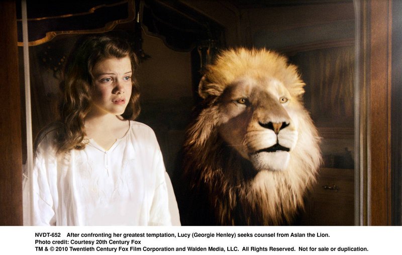 Lucy (Georgie Henley) with Aslan the Lion.