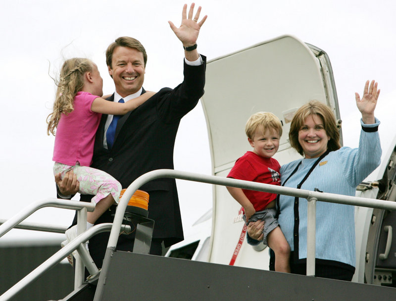 Elizabeth Edwards holds her son Jack as her husband, John, then a Democratic senator from North Carolina, carries their daughter Emma Claire while they depart the campaign plane in Boston in July 2004. Besides advising her husband on political strategy and writing two memoirs, Edwards also was an advocate for health care reform and for the poor.