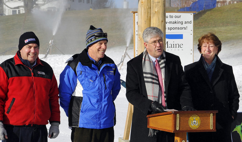 Portland Mayor Nicholas Mavodones speaks from the podium. With him are Tim Rearden of Quirk Chevrolet, left, Greg Sweetser of Ski Maine and Councilor Cheryl Leeman.