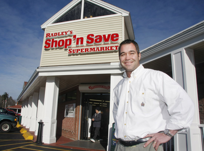 Ed Radley shows off the new storefront of Radley's Shop 'n Save Supermarket in Old Orchard Beach on Thursday. The store opened Sunday as Hannaford's newest independent retailer.