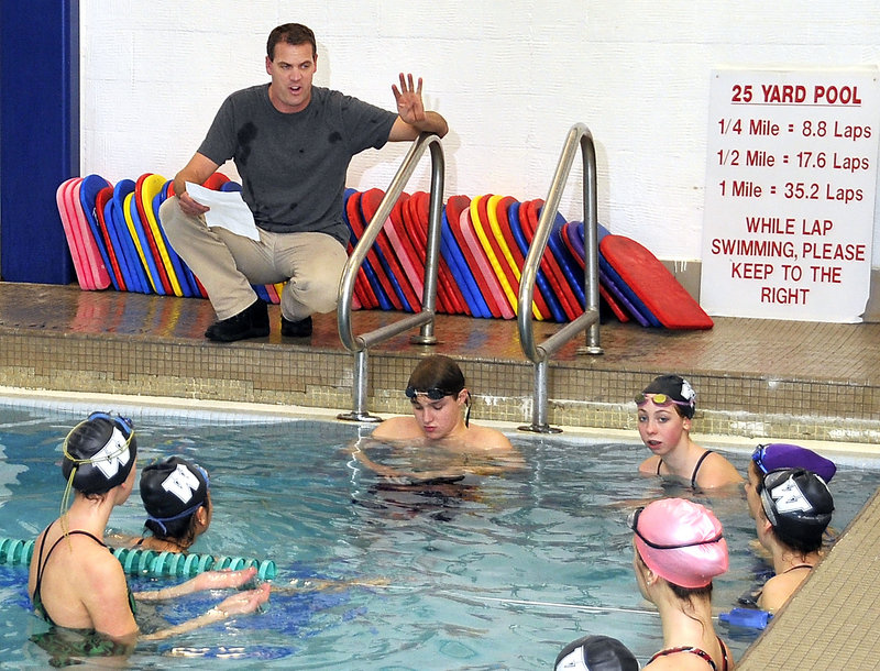Jim Harvey, a former swimmer for Bucknell and the U.S. national team, is the head coach for a Waynflete team made up of 13 girls, including his daughter, and one boy.