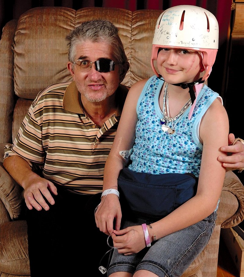 Nicole Guerrette is shown with her father, William Guerrette Jr., after they were released from the hospital in July 2008 following an attack at their Pittston home. Both suffered serious injuries.