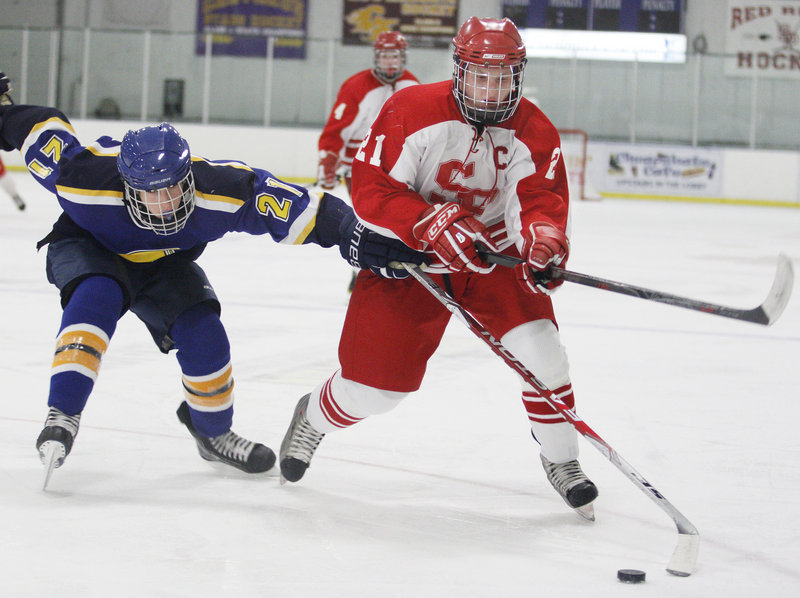 Defenseman Tommy Ellis, right, is part of an experienced South Portland squad looking to build on last year’s success.