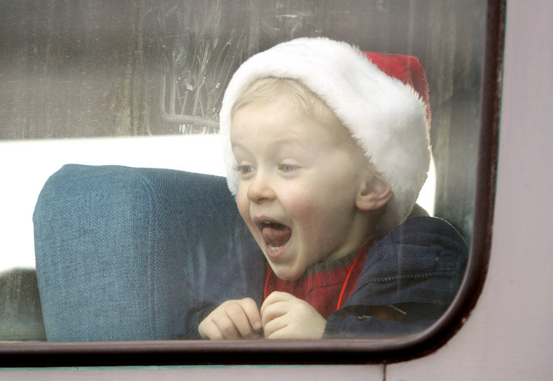 Jack Burnham, 5, of Norway shows his excitement as the Candy Cane Train prepares to leave Bath on Saturday.