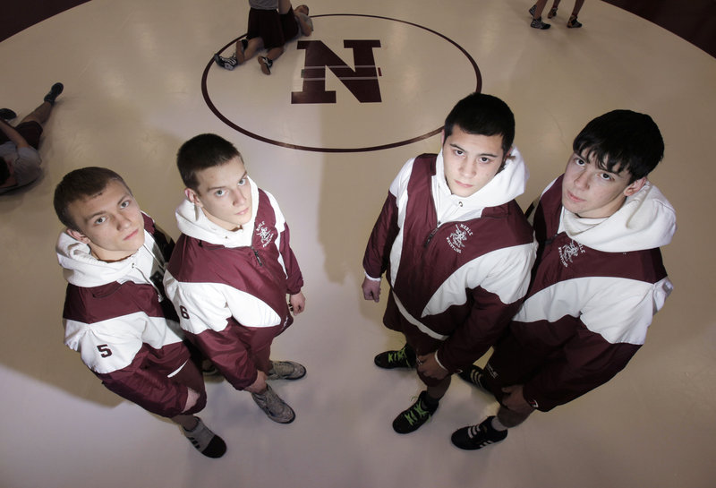 Gregory Rec/Staff Photographer Reigning state champion wrestlers returning for Noble High this year are, from left, Jake Bagley, Tyler Beaudet, Ben Valencia and Joey Badger. Valencia acknowledges the program’s history inspires him.