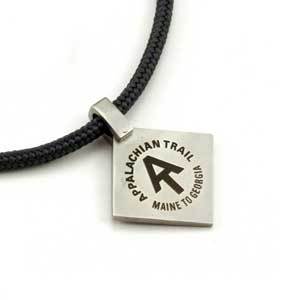 Purchases of jewelry featuring Appalachian Trail hikers, blazes and logos benefit trail conservation.