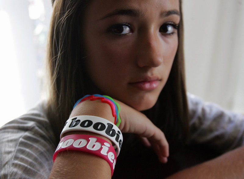 Eighth-grader Taylor Trujillo wears the “boobies” bracelets that she was forced to remove at Granite Ridge Intermediate School in Fresno, Calif., earlier this year. Trujillo is one of several students across the country who have been disciplined for wearing the bracelets.