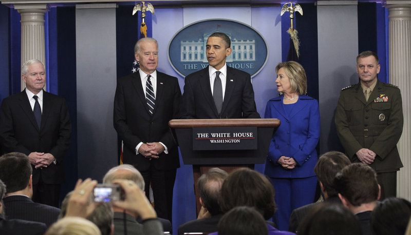 President Obama talks about the Afghanistan-Pakisan Annual Review during a briefing in the Brady Press Briefing room in the White House Thursday. From left are Defense Secretary Robert Gates, Vice President Joe Biden, the president, Secretary of State Hillary Rodham Clinton, and Joint Chiefs Vice Chairman Gen. James Cartwright. A five-page summary of the 40-page review says al-Qaida has metastasized outside the region.