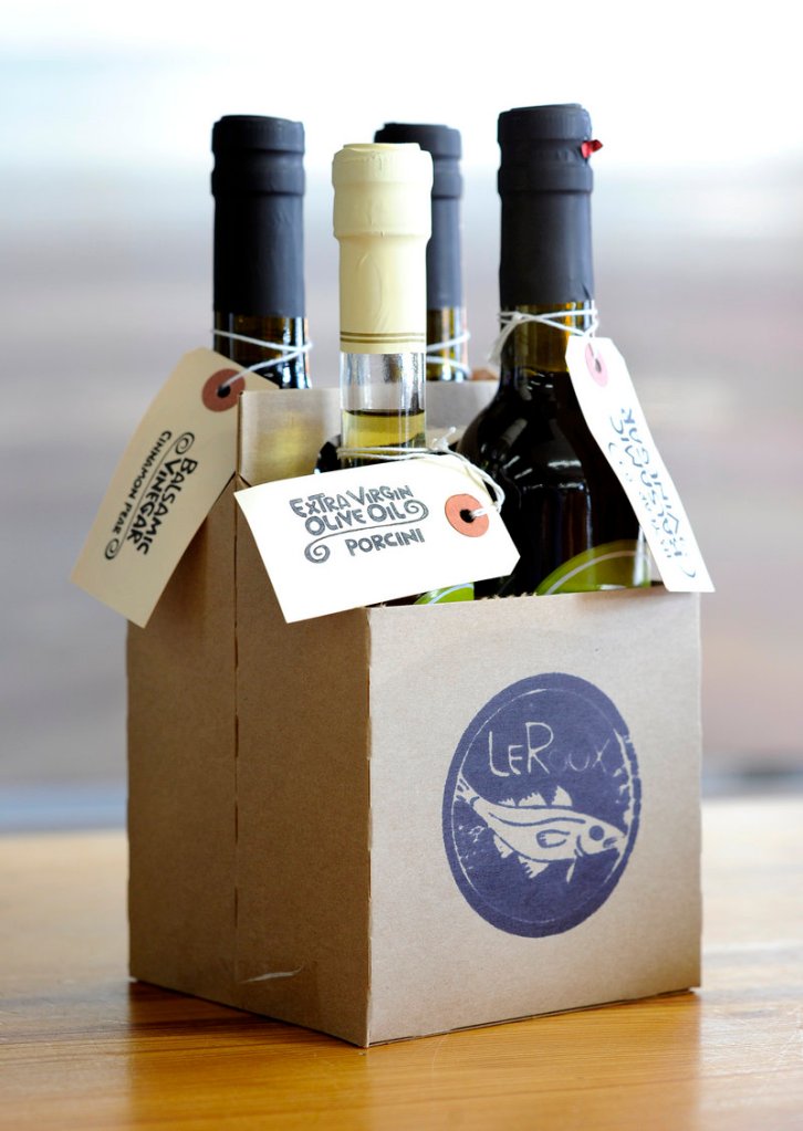 Gift packs of olive oils and vinegars are big sellers this year at Le Roux Kitchen on Commercial Street in Portland.