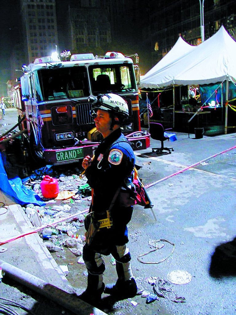 Capt. Mike Clarke of the Bath Fire Department works at New York’s ground zero in this 2001 FEMA photo. A newly elected state representative, he is pushing for extra federal funding for 9/11 responders’ health care.