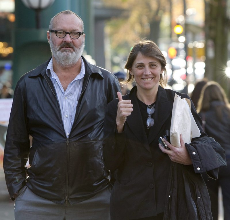 Randy Quaid and his wife, Evi, are shown outside their lawyer’s office in Vancouver. She has failed again to appear in court in California.