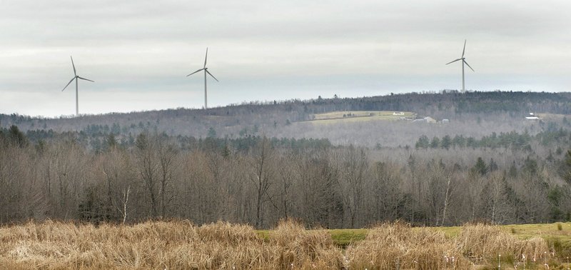 Turbines tower over Beaver Ridge in Freedom. Whether Mainers embrace wind farms in their backyards or not, the Wind Energy Act of 2008 is facilitating development.