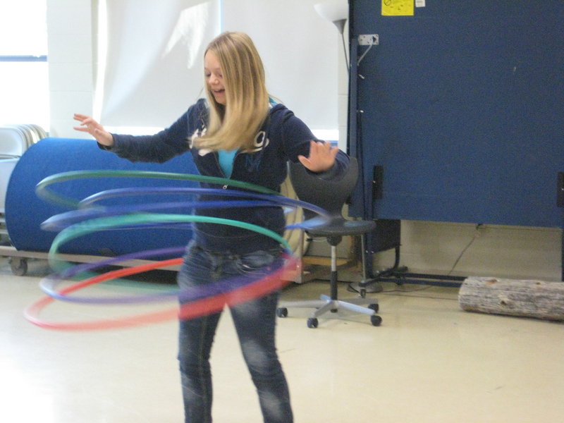 Eighth-grader Anna Perkins displays her skill with Hula Hoops, and as a result helps raise more than $1,300 for an orphanage in India.