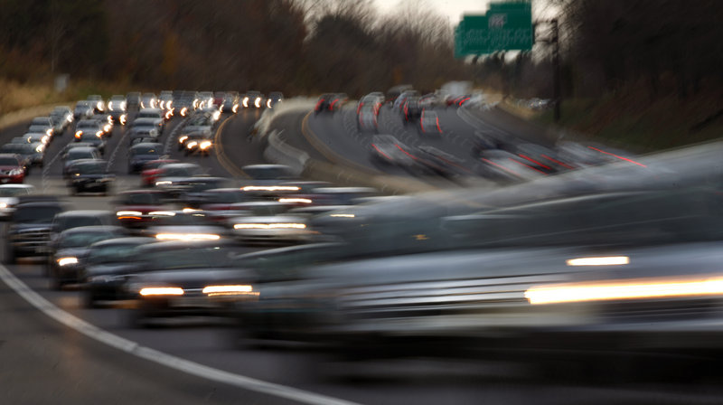 Traffic moves north on Interstate 270 in Germantown, Md., on the day before Thanksgiving. The country’s demand for gasoline is shrinking as vehicles become more fuel-efficient, the government mandates the use of more ethanol and people drive less. Worldwide demand will grow, however, paced by China and India.