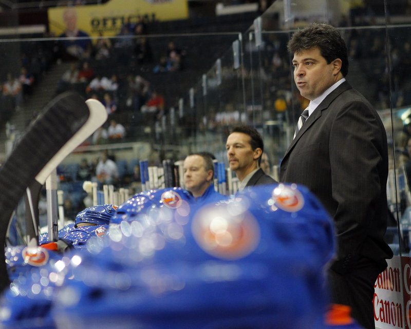 Jack Capuano, an All-America defenseman at the University of Maine, is in his second month as interim head coach of the New York Islanders after spending four seasons leading the Bridgeport Sound Tigers of the AHL.
