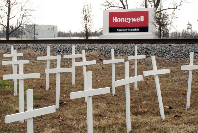 White crosses set up by locked-out union workers outside a Honeywell uranium conversion plant in Metropolis, Ill., represent former workers the union says died of cancer.