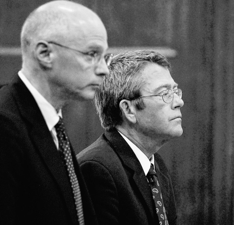 John D. Duncan, right, stands with his attorney Toby Dilworth as he is sentenced in Cumberland County Superior Court in Portland. Several of Duncan's former partners at Verrill Dana still face possible sanctions.