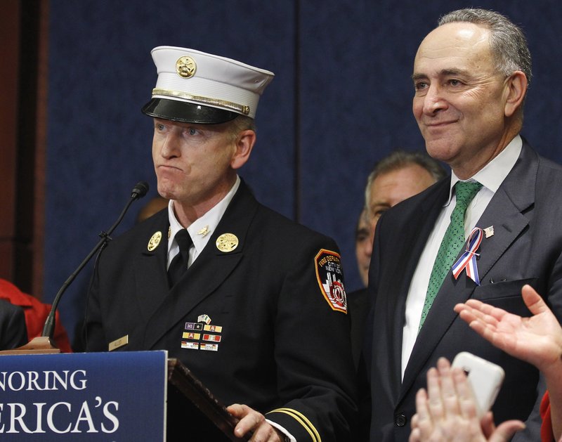 New York Deputy Chief Richard Alles and Sen. Charles Schumer, D-N.Y., take questions after the Senate approved aid to 9/11 first responders.