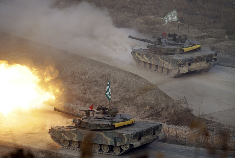 South Korea K-1 tanks fire live rounds on the Seungjin Fire Training Field in Pocheon, 20 miles from the Koreas’ heavily fortified border, on Thursday. North Korea condemned the drills as “a grave military provocation.”