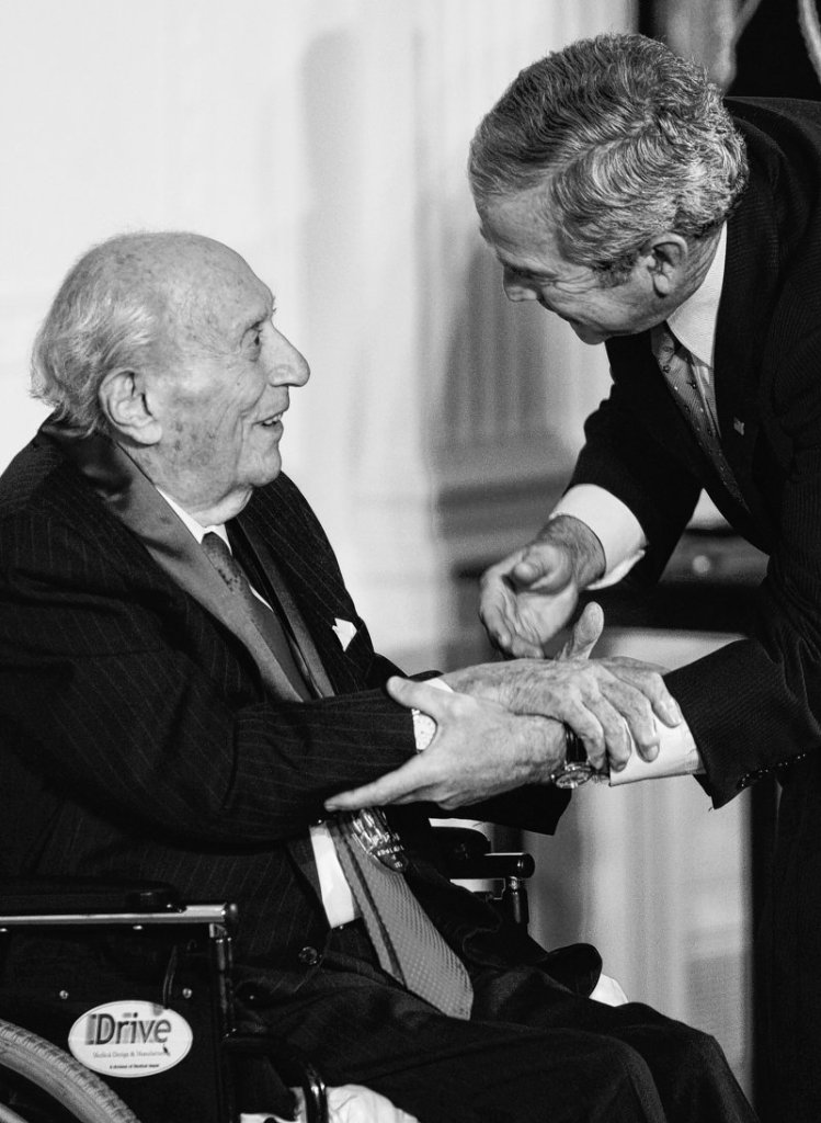 President Bush presents the 2007 National Medal of Arts to patron Roy R. Neuberger to honor his support of modern art.